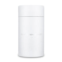 White cylindrical container with 'DLUX' branding on a white background
