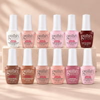 Gelish Pro Brush-On Builder Gel 15ml – 12 colour bottles on an ivory display with blush background