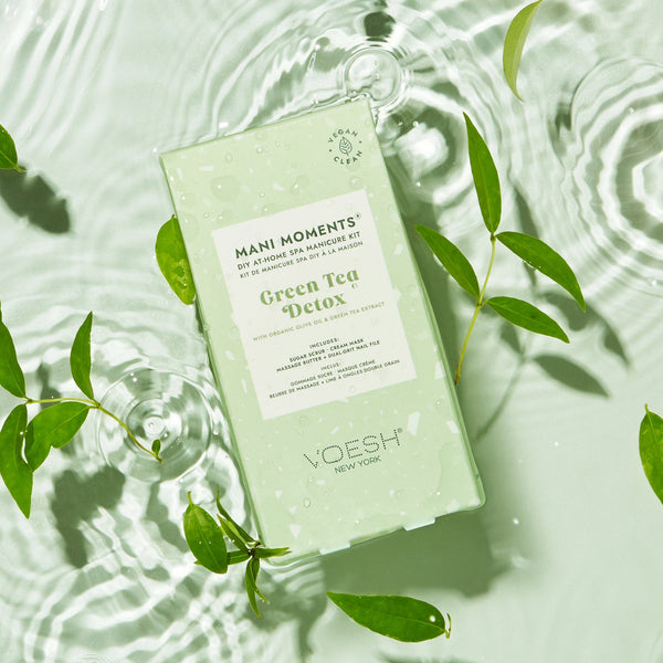 VOESH Green Tea Detox mani moments kit with green leaves on a light background