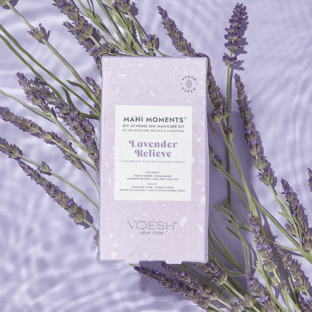 Purple packaging of 'Mani Moments' lavender hand care kit on a white background